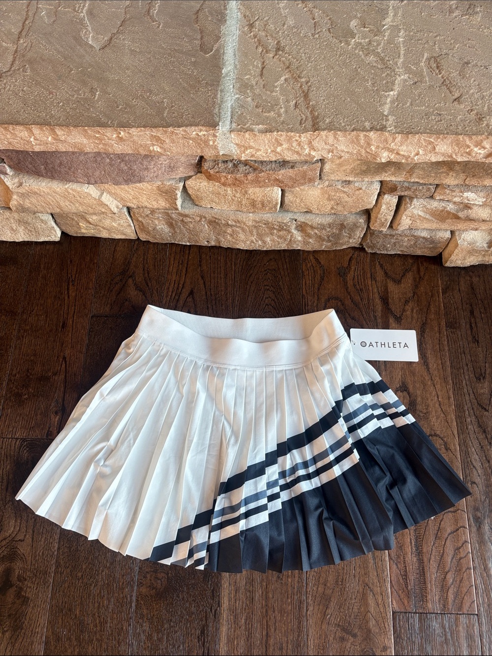 Athleta White Pleated Skirt with Black Stripe Accent